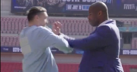 Watch Daniel Dubois shove Oleksandr Usyk in first faceoff ahead of rematch